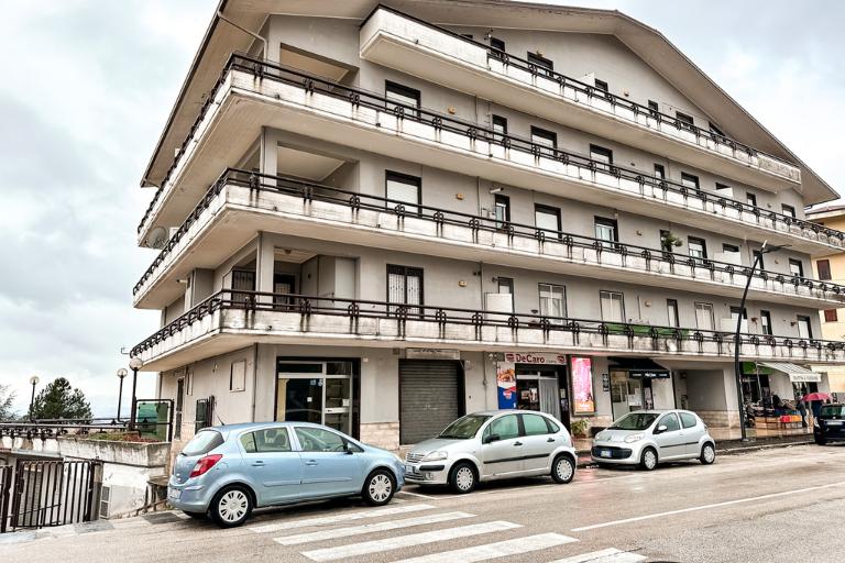 cars parked on a crosswalk in an Italian town